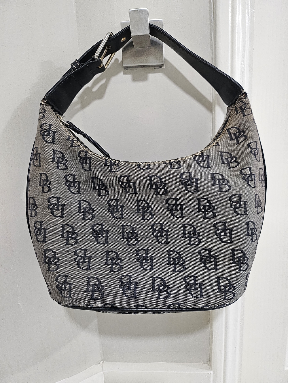 Dooney BOURKE Gray Canvas small Hobo Bag with Black Strap.